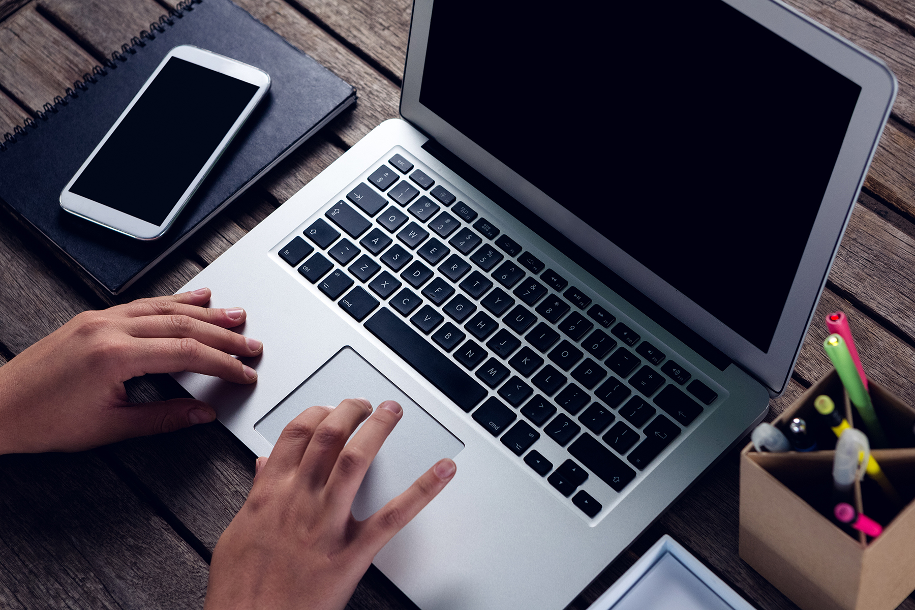 Laptop and phone on desk